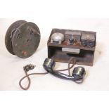 A British Army telephone set, D mk V and a reel of cable