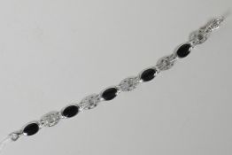 A 925 silver, marcasite and black enamel bracelet, 7½" long