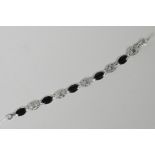 A 925 silver, marcasite and black enamel bracelet, 7½" long