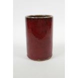 A Chinese red flambe drip glaze pottery brush pot, 5½" high x 3½" diameter