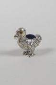 A novelty sterling silver pincushion in the form of a dodo, 1"