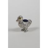 A novelty sterling silver pincushion in the form of a dodo, 1"