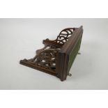 A rosewood clock bracket with pierced decoration, 10" x 5" x 9" high