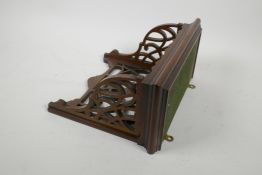 A rosewood clock bracket with pierced decoration, 10" x 5" x 9" high