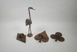 Three iron pricket sconces in the form of card suits, together with an iron and wood figure of a