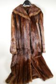 A vintage full length fur coat