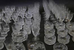 A suite of Royal Doulton crystal drinking glasses, and others associated