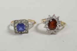 A 9ct gold lady's dress ring set with a sapphire encircled by smaller stones and another similar set