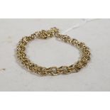 A 9ct gold double link bracelet, 7" long, 9" long with safety chain, 11.6g