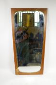 A 1970s teak pier glass mirror, 15" x 27½?