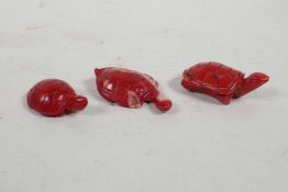 Three carved coral tortoises, 2" long