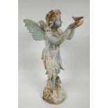 A cast metal garden figure of a fairy holding a bird, 20" high