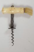 An antique double helix steel corkscrew with bone handle and hair brush, 6" long