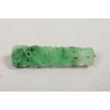 A Chinese white metal brooch set with jade, early C20th, 2" long