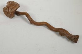 A Chinese carved hardwood Ruyi in the form of a root, 13½ " long