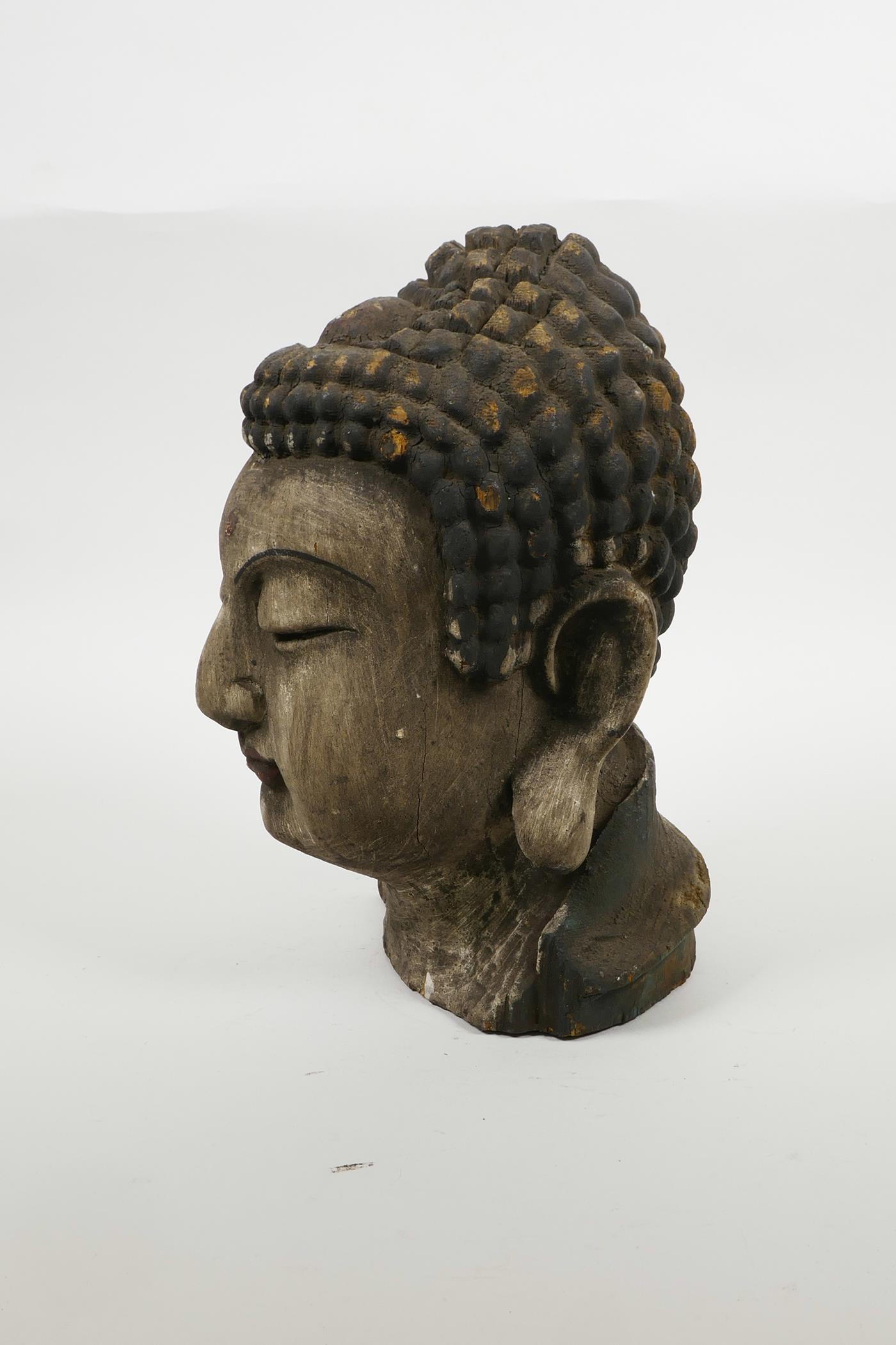 An oriental carved and painted Buddha head, 9½" high - Image 2 of 5