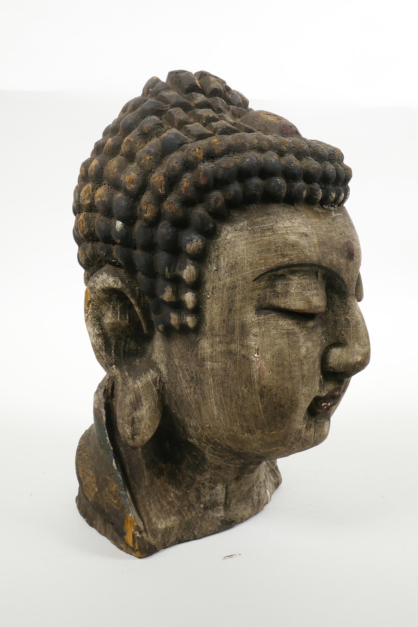 An oriental carved and painted Buddha head, 9½" high - Image 5 of 5