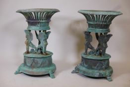 A pair of bronze Empire style pierced garden planters with harpy decoration and verdigris patina,