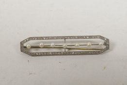 A fine Art Deco white metal, diamond and seven seed pearl bar brooch, 2¼? long, 7.2g