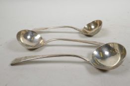 Three Georgian and Victorian sterling silver soup ladles; one by Chawner & Co (George William