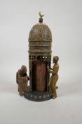 After Bergman, a cold painted bronze figure of an Ottoman tent, opening to reveal a nude woman and