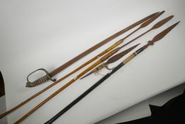 A C19th British officer's sword with brass basket guard, 38" long, together with two Zulu short