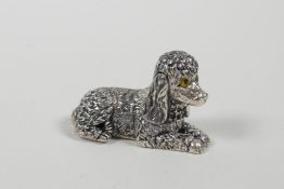 A sterling silver poodle, 1" long