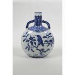 A small Chinese blue and white porcelain two handled moon flask, six character mark to base, 7" high