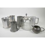 Five pewter tankards, a pewter cream jug and an engraved glass tankard with pewter lid, 6½" high (7)
