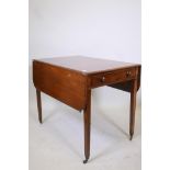 A George III mahogany pembroke table with single end drawer, raised on tapering supports, 36" x