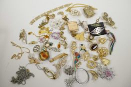A box of costume jewellery etc including a gold plated vesta case etc