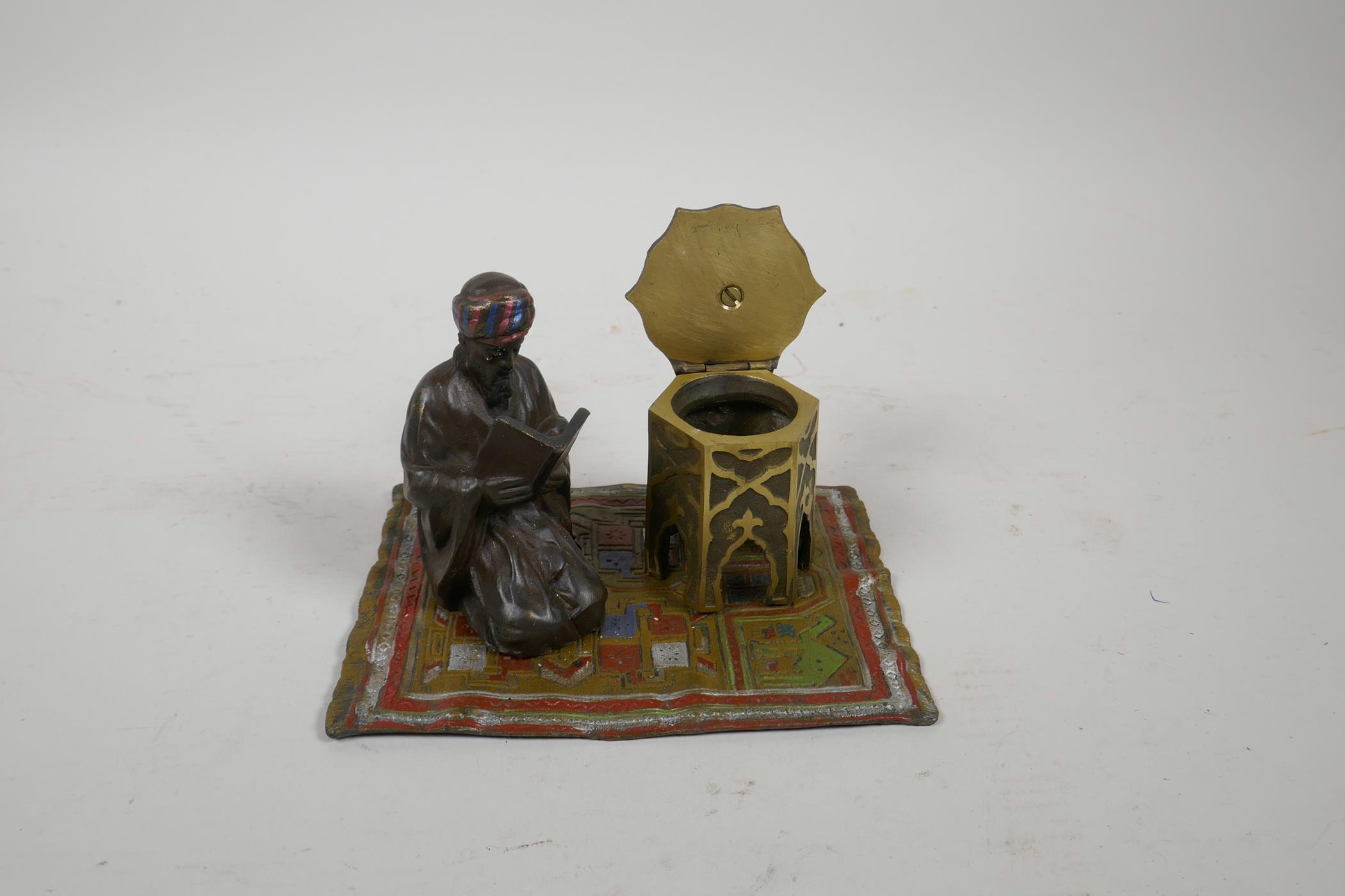 A cold painted bronze figure of a Moor on a carpet, impressed 'B' to base, 6" x 4" - Image 4 of 5