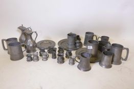 A quantity of C19th and later pewter mugs and jugs etc