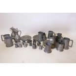 A quantity of C19th and later pewter mugs and jugs etc