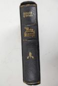 A 1938 edition of Mein Kampf by Adolf Hitler in German, the front bearing a dedication to the