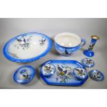 A late 1940s Staffordshire Falcon ware toiletry and dressing table set, decorated with enamel