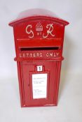 A cast iron and metal postbox with key, 23" x 14½" x 11"