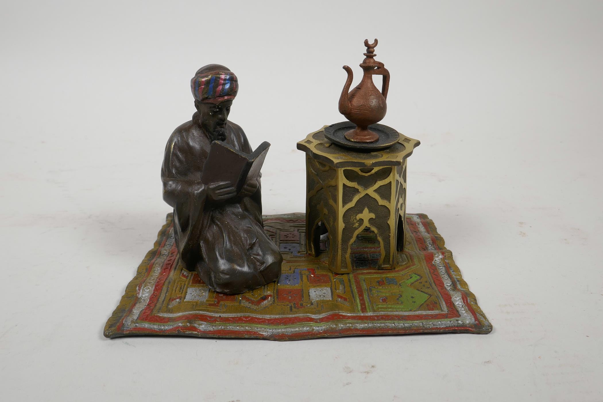 A cold painted bronze figure of a Moor on a carpet, impressed 'B' to base, 6" x 4" - Image 2 of 5