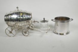 A silver plated table top brandy barrel on a wheeled carriage, 8" high, together with a silver