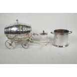 A silver plated table top brandy barrel on a wheeled carriage, 8" high, together with a silver