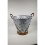 A galvanised olive bucket, 14" high, 16" diameter