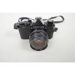 A Pentax MV single lens reflex 35mm camera, together with a Pentax M 1:250 mm lens