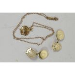 A Shell Oil company 9ct gold stone set shell pendant, on a 9ct gold chain, 3.9g, together with a