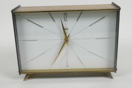 A vintage Schatz brass cased mantel clock with gilt hands and a striking movement, 8" long