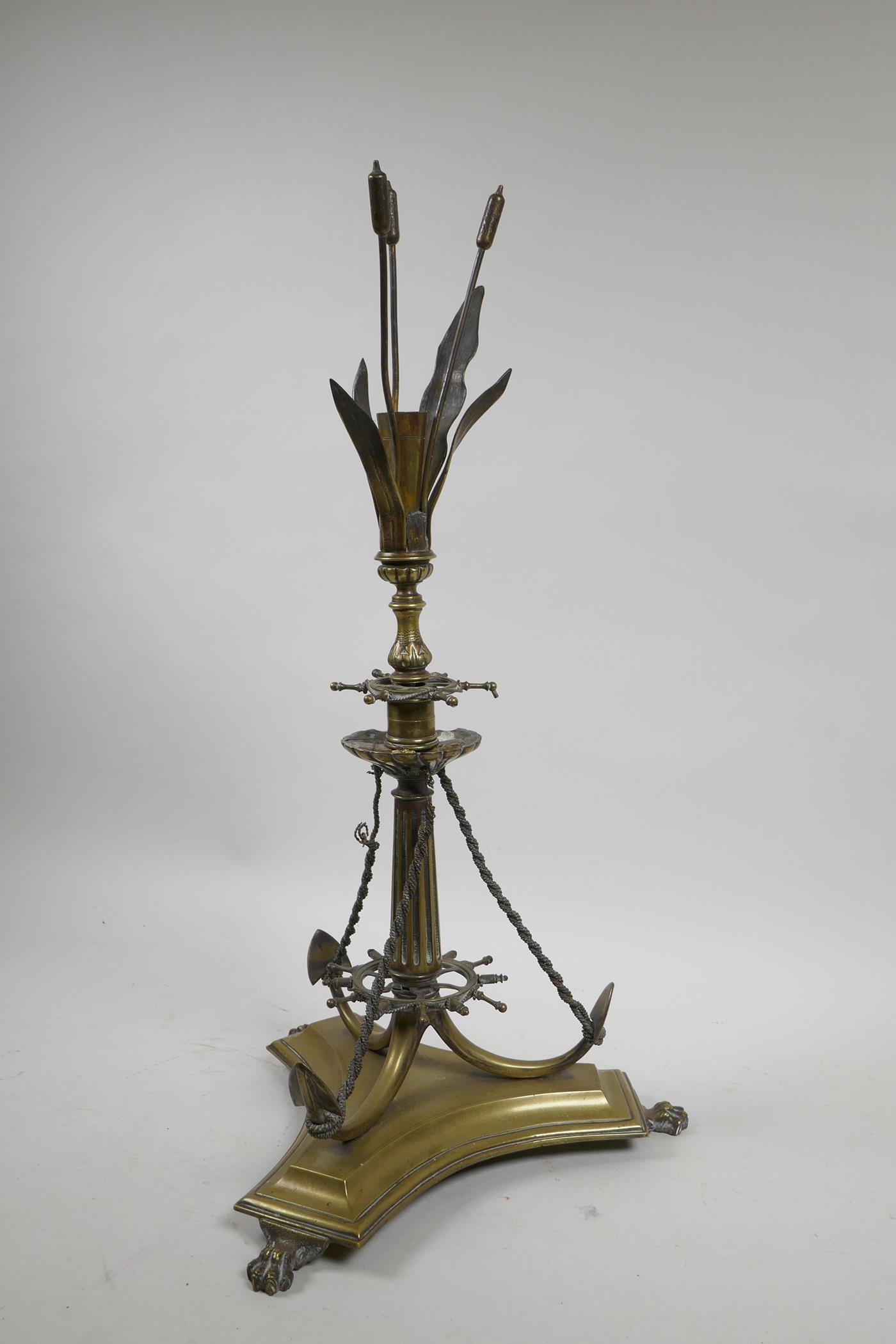 An unusual brass centrepiece on a triform base with nautical decoration, 19½" high, A/F - Image 2 of 5