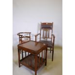 An Arts & Crafts elbow chair, a corner chair with bow back and a two tier mahogany occasional
