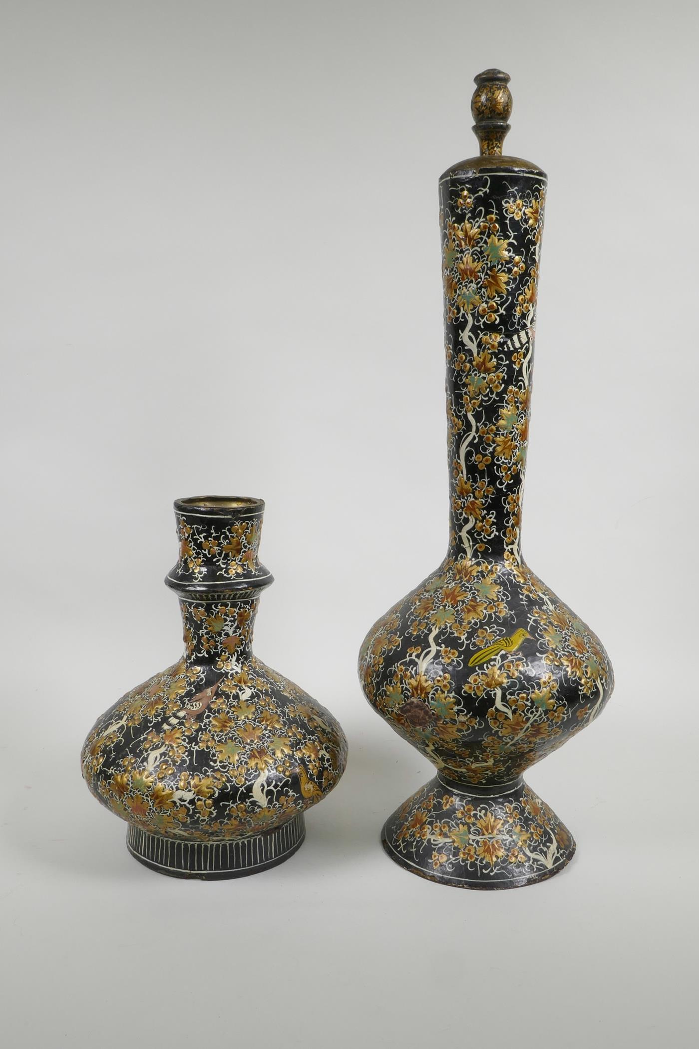 A Kashmiri papier mâché and brass hookah base, and another similar, decorated with birds amongst