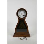 A late C19th French rosewood cased mantel clock by Malecot of Paris, the movement striking on a
