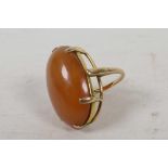 An unmarked gold set chalcedony dress ring, size P/Q