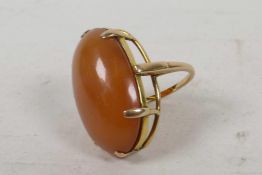 An unmarked gold set chalcedony dress ring, size P/Q